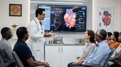 An Indian cardiologist discussing heart surgery with international patients at Apollo Hospital.