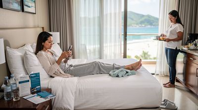 An American patient and companion relaxing in a hotel room near a Puerto Vallarta clinic, reviewing travel documents.