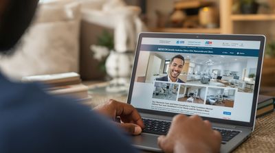 A patient researches accredited Mexican dental clinics online for whitening treatment.